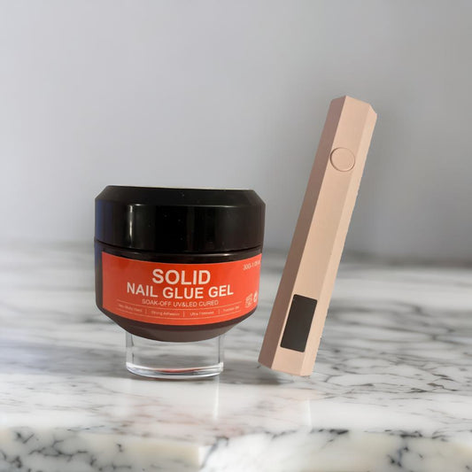 Solid nail glue and UV lamp pen kit
